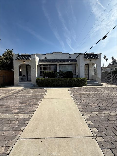 Photo of 5112 S Van Ness Ave, Los Angeles, CA 90062 (MLS # SB25270085)