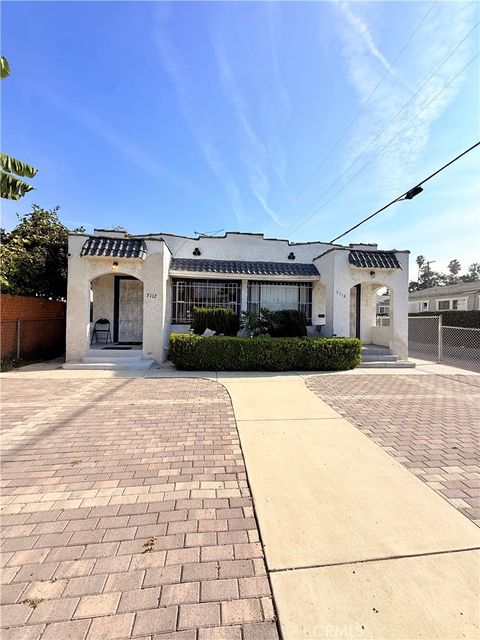 Photo of 5112 S Van Ness Ave, Los Angeles, CA 90062 (MLS # SB25270085)