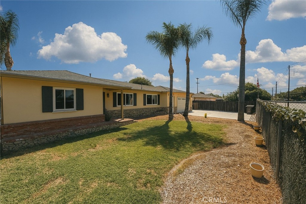 This North Chino home offers incredible potential and unbeatable convenience, located near freeways, shopping, and restaurants. The property features 4 bedrooms (1 without a closet), an oversized 2-car garage, and RV parking on both sides of the home—perfect for extra vehicles, toys, or trailers. The original 950 SF home has been expanded with an additional 564 SF unpermitted family room and 4th bedroom, providing flexible space for entertaining, a home office, or multi-generational living. Enjoy peace of mind with dual-pane windows and a newer water heater, and relax outdoors under the Alumawood patio cover. With its prime location and hard-to-find RV access, this home is a great opportunity for buyers looking for value, space, and convenience in a desirable neighborhood.