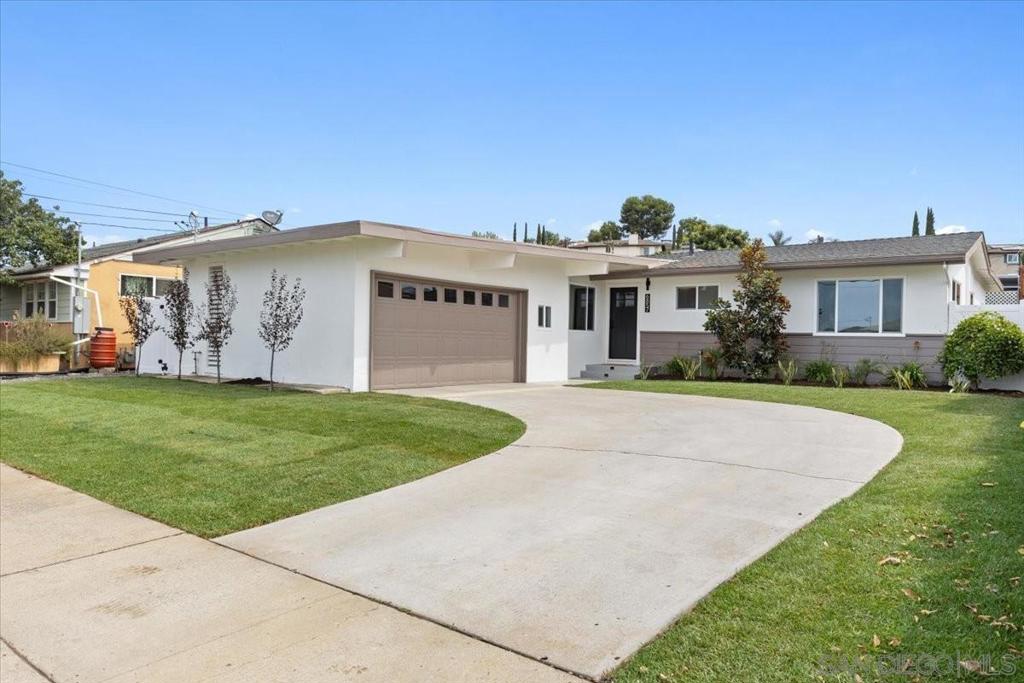 A stunning blend of Traditional and Mid-Century Modern, this 5 bed, 3 bath Del Cerro home is a true showstopper! Step inside to vaulted ceilings with faux wood beams, a striking sputnik chandelier, and clerestory windows that flood the home with natural light. The kitchen boasts a full suite of stainless-steel appliances, quartz countertops, and a beverage cooler for added convenience. Two primary suites set this home apart—the main retreat features a walk-in closet, chic pendant lighting, and a spa-inspired bathroom, while the second en-suite is ideal for guests, extended family, or potential ADU use. Recent upgrades include a new roof, windows, and HVAC for year-round comfort. Outside, the meticulously maintained backyard offers the perfect space to entertain or unwind in complete privacy.