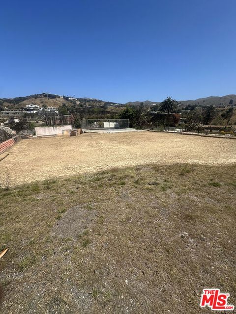 Photo of 1000 Glenhaven Drive, Pacific Palisades, CA 90272 (MLS # 25550949)