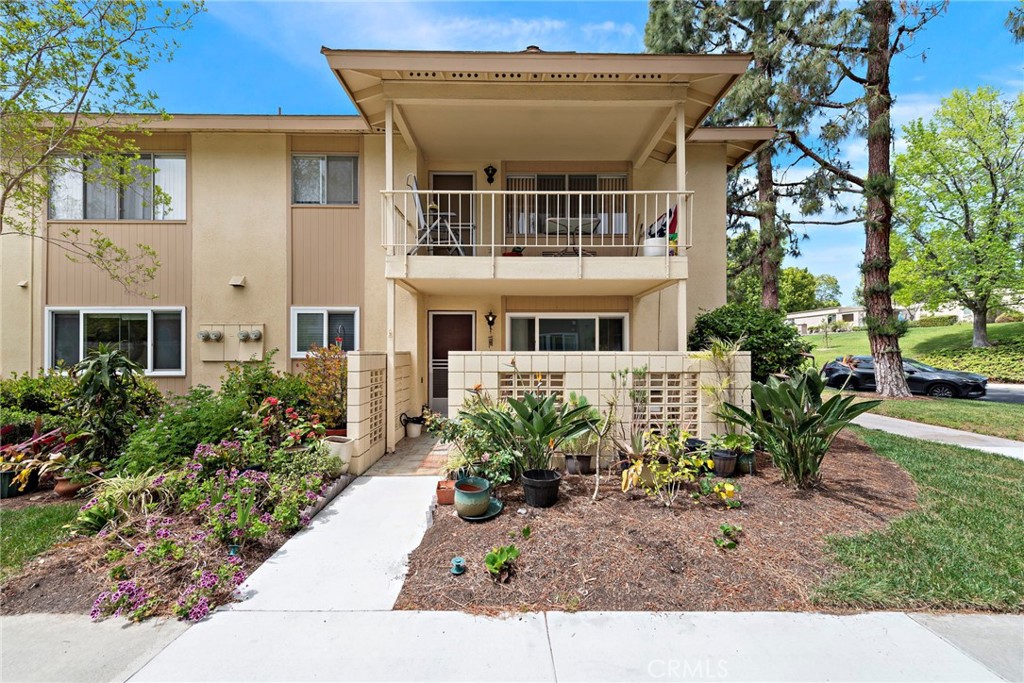 Welcome to 174 Avenida Majorca #A, a well-appointed lower “Cadiz” model located in the quiet, beautifully maintained 55+ community of Laguna Woods Village. This single-level, end-unit home offers 1 bedroom and 1 bathroom across 770 square feet, with no interior steps and easy access throughout.
Inside, the layout is open and functional, with natural light filling the main living space. A private patio just off the living room provides a quiet place to unwind, with peaceful views of the surrounding greenbelt and mature trees. The kitchen features a raised countertop, updated sink and faucet, and clean, well-kept appliances.
Additional features include double-pane windows, fresh paint, neutral carpeting, blinds throughout, and an A/C unit in the living room for added comfort.
The location is ideal — just steps from the Aliso Creek walking path, with convenient access to nearby laundry, a carport, and plenty of street parking in front and in the cul-de-sac.
Laguna Woods Village offers a wide range of amenities, including a 27-hole golf course, tennis courts, pools and spas, fitness centers, an equestrian center, RV storage, and multiple clubhouses. Residents also have access to creative spaces like art studios, a library, computer labs, and over 200 clubs and social groups. Local transportation within the community and to nearby shopping and medical facilities is included.
A low-maintenance home in a well-established community, with thoughtful upgrades and a great location — this is a smart choice for comfortable, connected living.