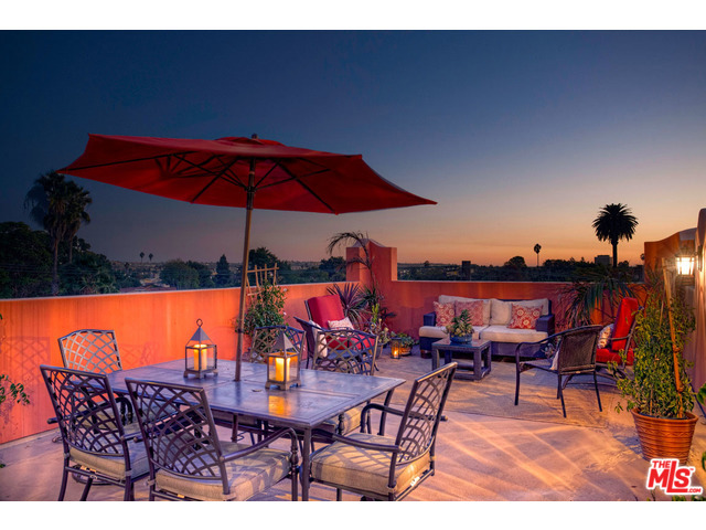 Adjacent to the Silicon Beach technology hub, this Mission-style residence offers unmatched functionality at an exceptional value.Upon entry, sophisticated design establishes an authentic Spanish architectural flair. Solid oak doors open to Unit A's living room and kitchen, boasting stainless appliances, granite counters and authentic Saltillo tile. Upstairs, Unit A's floor plan offers 2 bedrooms and a graciously appointed full bath. Unit B continues upstairs, offering a true master suite along with two additional bedrooms and a shared hallway bath. Both units enjoy access to separate private rooftop patios- offering the perfect setting to watch beautiful Southern California sunsets.