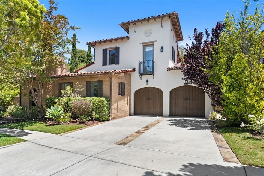 Now, the best value in Turtle Ridge on condition, location, and price per SF for this stunning Mediterranean-style home, built in 2004 and offering 4 bedrooms and 4.5 bathrooms across approximately 3,450 square feet of refined living space all nestled on a 6,500 square foot lot on a cul-de-sac street all graced by a dramatic 34 feet of back yard privacy hedge and mature Italian cypress trees. Inside, warm walnut floors, stone-tiled baths, an open chef’s kitchen with granite counters, stainless appliances, double ovens, and a six-burner cooktop, plus a downstairs bedroom suite, powder room, and laundry room with sink ensure both comfort and convenience. Outdoors, the private yard, faux grass, fire pit, built-in barbecue area, gazebo, and private atrium entry with fountain create a seamless indoor-outdoor lifestyle in front and back areas. Located in the guard-gated Turtle Ridge community, this property enjoys top-tier community amenities such as Olympic-size pool, hot tubs, cabanas, two clubhouses (one with theater), fitness center, playgrounds, BBQ areas, and miles of scenic trails in Bommer Canyon. Positioned just minutes from the 73 Toll Road, UCI, Fashion Island, and John Wayne Airport, it offers perfect fusion of prestige and accessibility. Top-rated Irvine Unified schools, Vista Verde K–8, Rancho San Joaquin Middle, and University High—serve the neighborhood, making it an ideal choice for families. In short, this turnkey sanctuary combines mature, low-maintenance landscaping, resort-style living, and top school access—plus that rare, towering hedge—for buyers seeking privacy, luxury, and lifestyle in one of Irvine’s most coveted communities.
