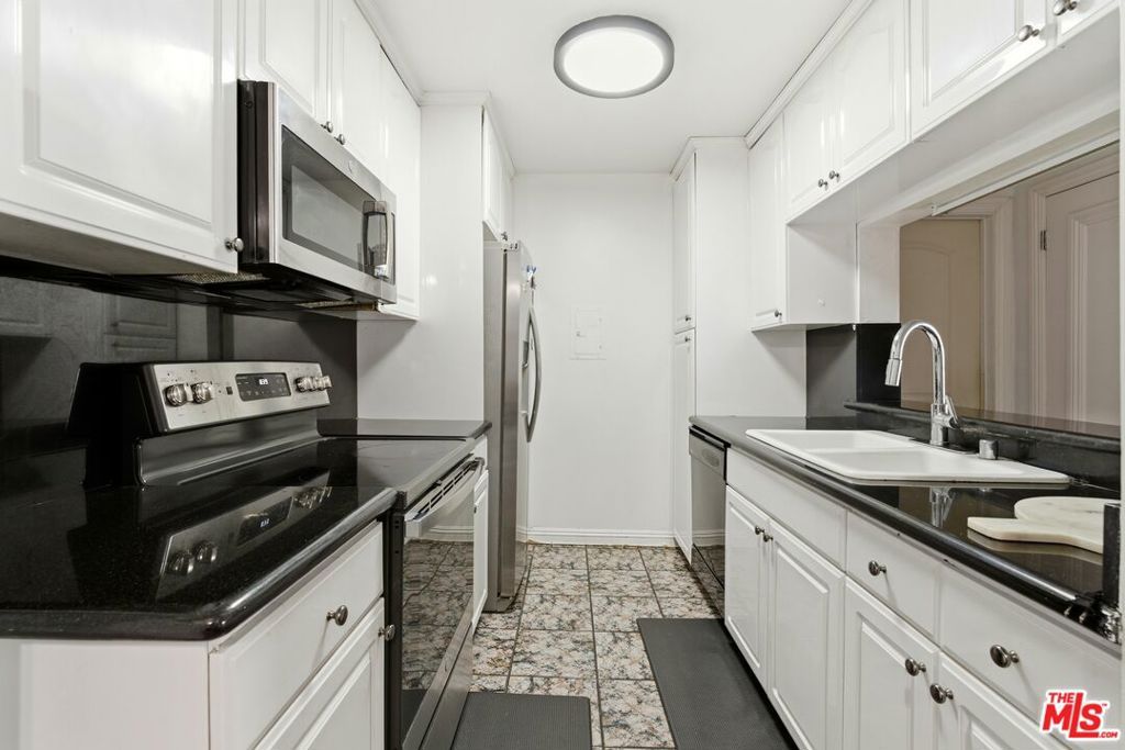 Photo of 5460 White Oak Avenue #G217, Encino, CA 91316 (MLS # 26664403)