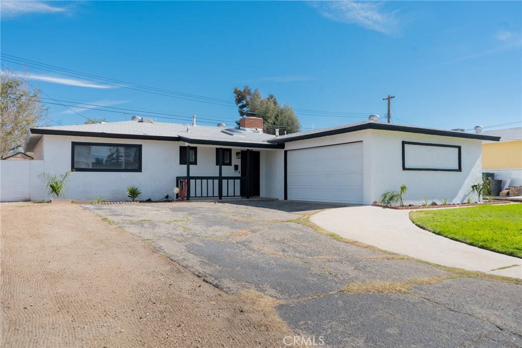 Beautifully Updated and Move-In Ready West Lancaster Home! This stunning 3-bedroom, 2-bath residence offers 1,540 sq. ft. of comfortable living space with a freshly repainted modern exterior. Inside, you'll find brand-new carpet and flooring, freshly painted interiors, remodeled bathrooms, and new kitchen appliances. Enjoy year-round comfort with central air and heating, ceiling fans throughout, and solar panels for energy efficiency. Additional highlights include a Vivint smart doorbell system, bonus den or additional room, and an attached two-car garage. Conveniently located down the street from an elementary school and just a street away from shopping centers and restaurants, this home perfectly blends modern upgrades, comfort, and convenience. Truly move-in ready, all that's missing is you!