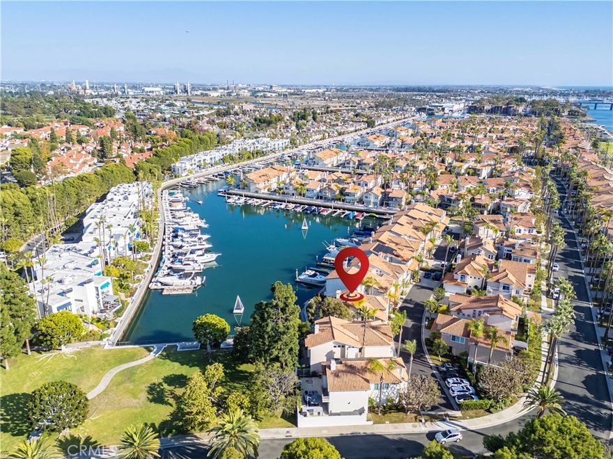 Perfectly situated in the desirable Spinnaker Bay community, 5517 China Point is a rare find, showcasing 60 feet of pristine, unobstructed water frontage with peaceful northeast exposure. From the moment you enter, you’ll be captivated by the serene setting, abundant natural light, and sense of privacy that defines this exceptional residence. This two-story home features high ceilings, creating a bright and airy ambiance throughout. The updated kitchen, fresh interior paint, and tasteful hardwood floors blend comfort with timeless style. With 2,307 square feet of living space on an oversized 3,468-square-foot lot, there’s room to relax and entertain in style. Step outside to your private waterfront backyard retreat, complete with a spacious patio and panoramic water and park views—the perfect setting for morning coffee, evening gatherings, or simply soaking in the tranquil surroundings.

Enjoy the unbeatable walkability to top-rated schools, the Colorado Lagoon, a scenic 18-hole golf course, dog park, and Marina Vista Park. This home delivers the ultimate coastal lifestyle in one of Long Beach’s most sought-after neighborhoods.