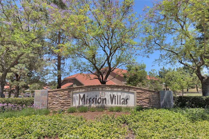 Welcome to Mission Villas, a gated community located in the highly desirable Mission Grove neighborhood of Riverside. This charming single-story, first-floor condominium offers an ideal blend of comfort, convenience, and resort-style living. Featuring 2 bedrooms and 2 bathrooms, this well-designed home welcomes you with a bright, open floor plan. The kitchen is thoughtfully designed with granite countertops, ample cabinetry, and a functional layout that opens to the main living area, allowing for easy interaction and natural light throughout. It's open to living space via a bar top and the open concept design. The spacious living room is anchored by a sliding glass door that lead to a private patio, offering a peaceful outdoor retreat ideal for morning coffee, evening relaxation, or container gardening. The primary suite provides a comfortable and private sanctuary, complete with mirrored closet doors, a second closet offering generous storage, and an ensuite bathroom featuring a separate vanity area for added functionality. The primary suite also has a sliding glass door to your private patio. A well-sized secondary bedroom and full bathroom offer flexibility for guests, a home office, or additional living needs. Mission Villas is known for its impressive community amenities, including a sparkling pool and spa, clubhouse, fitness room, BBQ and picnic areas, and convenient on-site laundry facilities, all set within beautifully maintained grounds. The gated setting adds an extra layer of privacy enhancing the overall lifestyle experience. Ideally situated in Mission Grove, this home is just minutes from shopping centers, dining, parks, schools, and major commuter routes including the 215 freeway, making daily errands and travel a breeze.
