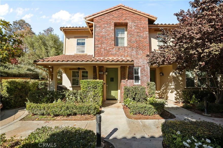 West Creek Valencia is a newer planned community with amazing amenities & coveted schools.  This end unit is model sharp, move-in condition and offers a reasonable HOA & NO Mello Roos taxes. This home  has been nicely upgraded featuring fresh exterior paint, high quality vinyl floors, granite counters, updated light fixture as well as newer kitchen sink, microwave, fridge, washer and dryer. Additional finishes include a custom barn door in the primary bedroom, newer ceiling fans, doors/hardware plus a smart thermostat and front door lock. Even the garage has been upgraded with epoxy floors, storage, lighting and a full gym. The West Creek community is highly sought after with plenty to do & enjoy such as the pool, spa, park, clubhouse & miles of paseos. The crowning jewel of the community is undoubtedly the West Creek Academy Elementary School (2025 CA Distinguished School award winner!) which is the primary draw for many buyers.  The location is excellent with the Town Center Mall, restaurants and plenty of shopping just minutes away.  Come home to West Creek Valencia!