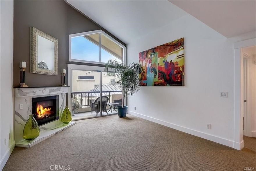 Welcome to this beautifully remodeled 2+2 Top Floor Penthouse condo with Pool Views, located in desirable "The Met" guard gated resort-style community.  This GEM proudly features a bright & open floorplan w/ soaring vaulted ceilings in living rm that includes a decorative stone fireplace and balcony w/ views.  Enjoy the upgraded Chef's Kitchen offering granite counters, sleek stainless steel appliances & breakfast bar. The Primary suite includes lovely views, and private upgraded ensuite bathroom. Step outside and enjoy your private balcony overlooking the tranquil pool area. Additional highlights include upgraded fixtures, inside laundry area, mirror wardrobe closets, tastefully upgraded secondary bathroom, & central A/C. Take advantage of all of the fantastic amenities this amazing community offers which includes 6 lighted tennis courts, 4 pools, indoor Basketball and Racquetball Courts, Fitness Center, Children's Play area and 24-Hour security. Prime quite location in building 10 that includes 2 covered tandem parking spots in the garage with elevator access to the 3rd floor. Centrally located nearby the Topanga Mall,  the Village, restaurants, bars, shops, parks, Ventura Blvd and the 101 Frwy. Perfect for home owner or investor with a potential built-in tenant. This RARE FIND is the one you've have been waiting for!