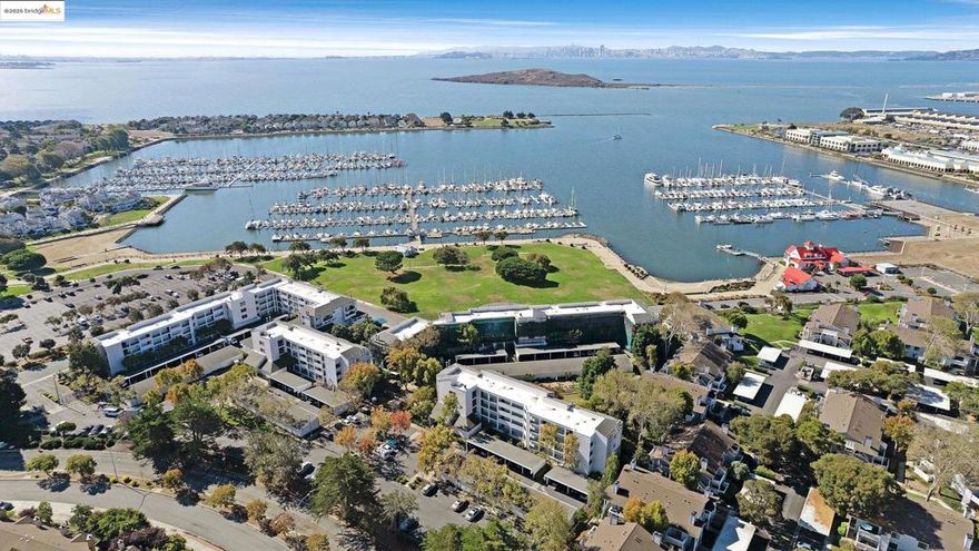 Enjoy gorgeous San Francisco and Marina Bay Views from south facing windows and 2 covered balconies. Directly across from the Bay Trail, nearby restaurants, shops and the Ferry. This freshly painted and updated 2 story, 2 bed/2-1/2 bath, townhouse style condo in the Marina Bay is waiting for you!  Easy access to the East Bay, Marin and San Francisco.  Beautifully remodeled kitchen with lots of cabinets and counter space. Wood floors in kitchen, living and dining area. Two large bedrooms with fully remodeled full ensuite bathrooms. Custom shutters on all windows. This is the largest unit style in the Northshore complex. Unit comes with one deeded covered carport with storage and potential for a charging station, and one additional uncovered parking space in this lovely, gated community. Don't miss this hidden gem!  OPEN HOUSE 4/7 and 4/14 from 2-4pm Accepting offers on 4/17 by 3pm