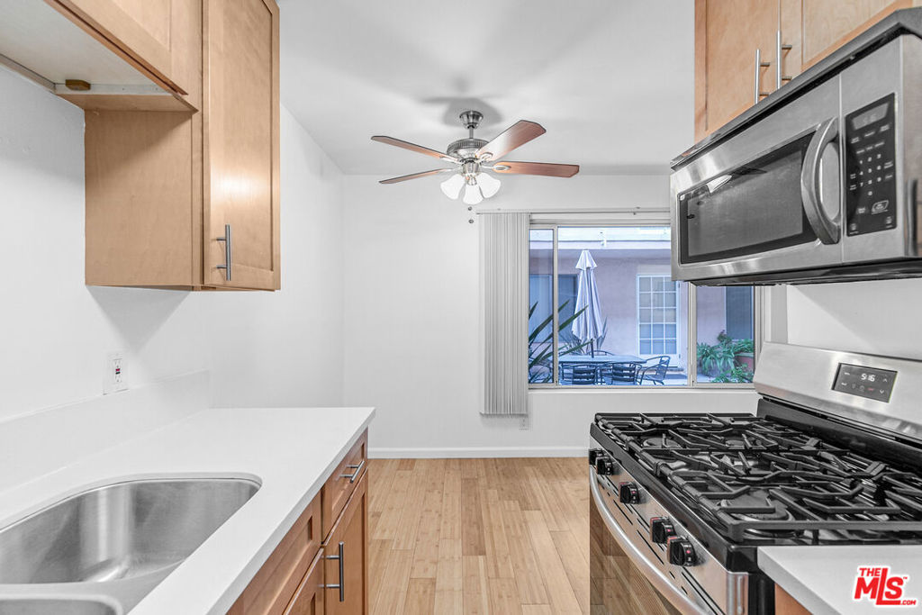 Skip the budgeting headaches! This sun-soaked 1-bedroom beauty comes with ALL utilities included, so you can spend more time enjoying your space and less time sorting through bills. Tucked into a quiet, well-maintained building just blocks from the beach, this ground-level unit offers warm wood floors, great natural light, and a layout that balances cozy and spacious just right. The living room flows into a dining nook and galley kitchen, complete with all the appliances for or all your culinary adventures (or late-night leftovers). The bedroom is generously sized and bright, with a big closet and en-suite bathroom to keep things streamlined. Mirrored closet doors make the space feel even more open. Pets are welcome, parking is included, and laundry is on-site. Oh!... and did we mention all utilities are covered? That's right: water, gas, electricity, even trash. Easy living, the Santa Monica way. Come check it out before someone else snags this stress-free slice of Westside life!