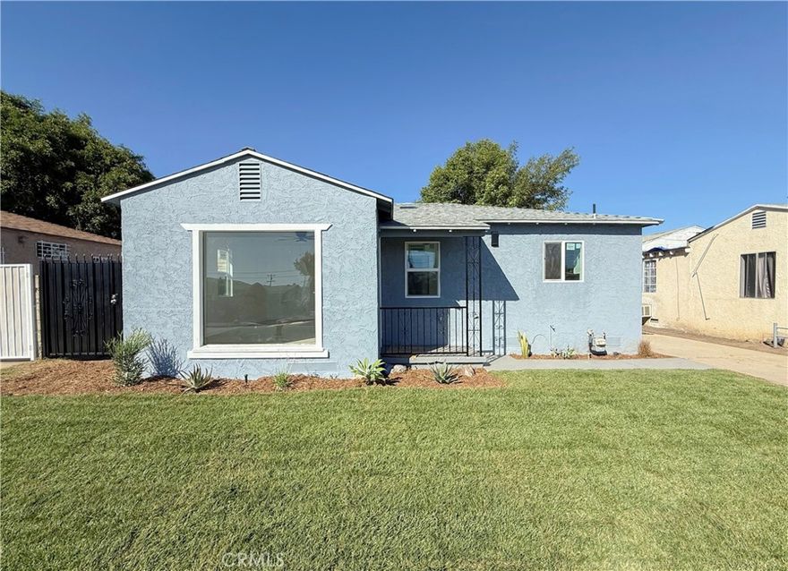 Absolutely stunning FULLY REMODELED single family residence consisting of a total of 3 bedrooms and 2 full bathrooms! This home is extremely spacious and beautifully laid out! The total amount of square footage of this property is EXTREMELY LARGE at approximately 1,522  sq ft on a LARGE 5,530 square foot lot! As you approach the house you will notice the BRAND NEW ROOF, NEW SOD and IRRIGATION SYSTEM along with a large concrete driveway that provides easy access to the LARGE CARPORT in the backyard! It is also important to note this property has BRAND NEW PLUMBING, BRAND NEW 200 AMP ELECTRICAL PANEL AND BRAND NEW ELECTRICAL REWIRE! As you enter the home you will notice the gorgeous BRAND NEW laminate wood flooring throughout the entire property along with beautiful tile and vanities in each REMODELED bathrooms! Next you are immediately drawn to the fully BRAND NEW REMODELED KITCHEN! This spacious kitchen also features BRAND NEW beautiful quartz countertops and BRAND NEW shaker cabinets. Continuing to make your way through the home, you’ll discover each bedroom is very generous in size and they all offer an ample amount of closet space. Next to the kitchen you will find a spacious LAUNDRY area. This home had a beautiful PRIMARY SUITE along with large bedrooms and 2 FULLY REMODELED BATHROOMS. In the backyard you will find beautiful landscaping with ample space to park multiple vehicles. This property is conveniently located near schools, shopping, parks and freeways, this one is definitely a MUST SEE! Priced to sell, it’s going to go quickly so schedule a tour today!