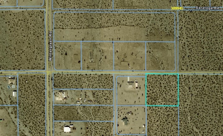 Land Has water and power in front of lot.