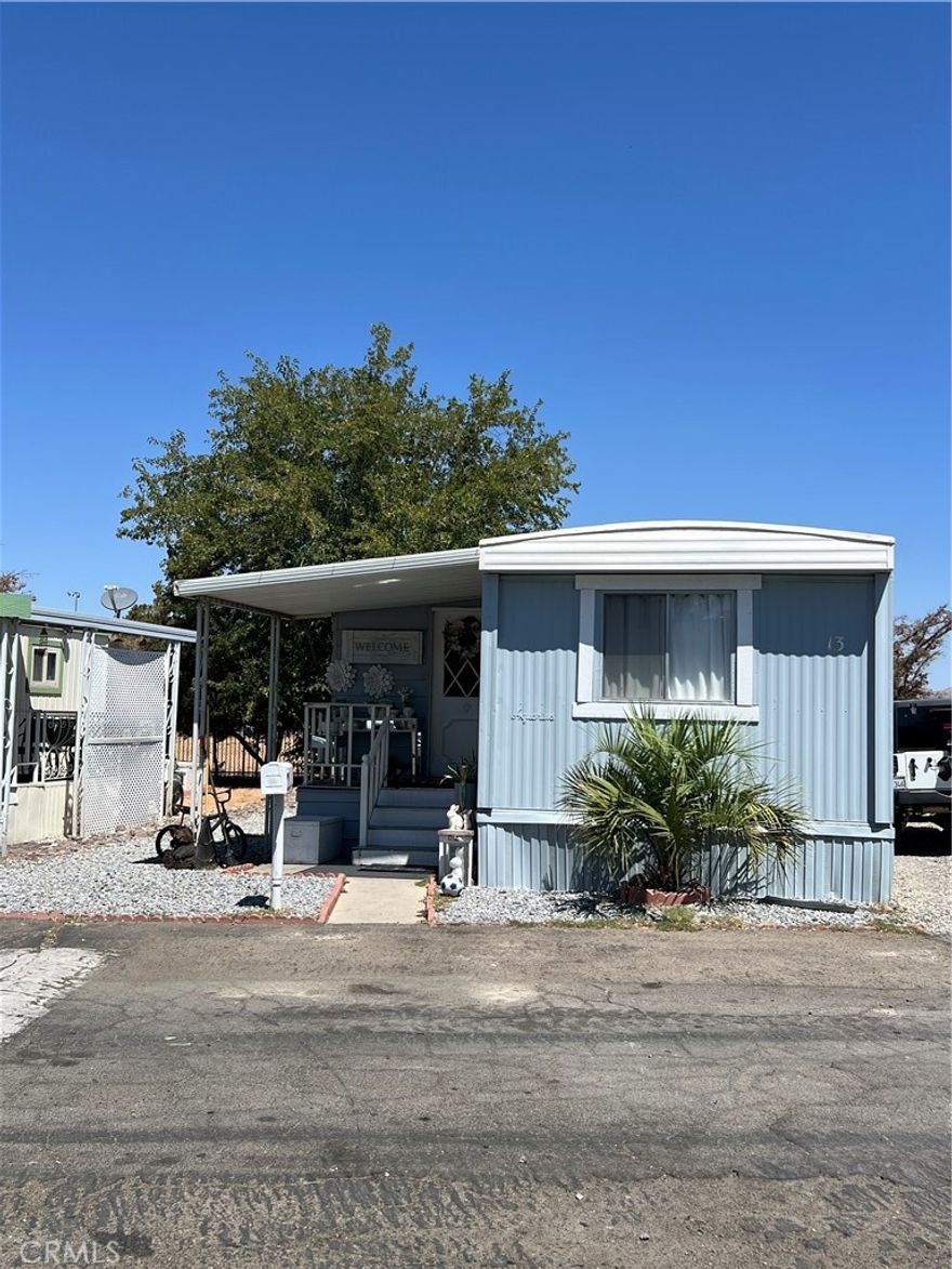 Single Wide Mobile Home 12X60 With A 8 x 15 Addition Or Living Room, so Living Room Appears to be a Double wide. Clean and Cute with a taste of greatness, Low space rent in this park, Newer Kitchen counters and added Cabinets, Indoor Laundry, Submit offers! BIG Big  Parking for 4 Car Spaces, nice private neighborhood, This Family Park has good Location.,,