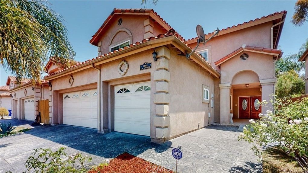 Gorgeous custom home in the highly sought-after Del Aire community! Built in 2005 and fully remodeled a few years ago, this stunning 4-bedroom, 4-bathroom home offers ~2800 square feet of luxurious living space within the prestigious Wiseburn School District. Featuring high ceilings, recessed lighting, and an open-concept floor plan that seamlessly connects the living, dining, family, and kitchen areas, this home is perfect for both everyday living and entertaining. The upgraded kitchen boasts granite countertops, stainless steel appliances, ample cabinet space, and a breakfast counter that opens to the family room. Three fireplaces create a warm and inviting atmosphere throughout, while each bedroom’s individual mini-split system allows for personalized comfort alongside central air conditioning for the entire home. The expansive primary suite includes a fireplace, a walk-in closet, and a spa-style bathroom with a jacuzzi tub, separate shower, and dual vanities. The beautifully landscaped and private backyard retreat includes a gazebo, built-in fire oven, and custom rock waterfall, perfect for outdoor gatherings and relaxation. Additional highlights include a three-car attached garage with laundry machines and abundant storage, three car driveway parking, double-paned windows, and wood flooring! Inquire further about the property’s AirBnB and income potential!