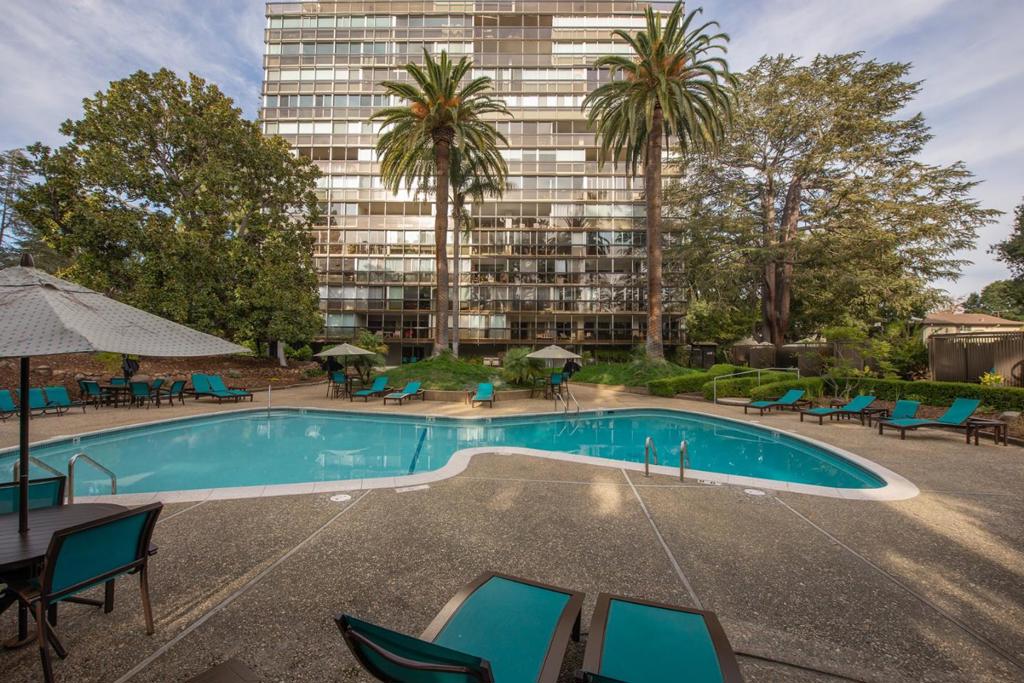 Enjoy living in contemporary luxury and convenience at "The Palo Alto". Gorgeous, re-modeled corner unit high rise in downtown Palo Alto. Panoramic views in living/dining room, as well as home office area, with floor-to-ceiling windows facing East. Cutting-edge design w/ high-quality architectural materials and finishes. An open floor plan is ideal for enjoying guests & family, or simply relaxing. Stunning Chef's kitchen with stainless steel appliances, quartz countertops, great cabinetry & breakfast bar. Beautiful bathrooms, color palette & designer light fixtures, desirable washer/dryer in unit. 24-hour security, resort-like pool, clubhouse & amenities, exercise room, on-site storage room. Great for down-sizers, lock it & leave it second homeowners, as well as busy professionals. Just minutes to Stanford University & Medical Center, Stanford Shopping Center, University Ave, Caltrain. Excellent Palo Alto schools. Easy access to Silicon Valley companies, HWY 101 and 280. Move-in ready!