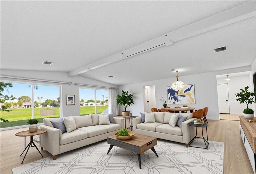 55+. Absolutely gorgeous view of golf course and mountains!! 433A is installed. Home has lots of windows and lots of natural light. You own the land.  This triple wide home sits on a large lot with a garage.  Beautiful open plan with three bedrooms or third bedroom can be used as a den or office. Upgraded kitchen, drywall, new laminate throughout. There is a large, covered patio plus a secure area for additional storage or parking on the other side of the house. Beautiful cul-de-sac lot . The low monthly homeowner fee includes unlimited golf for two owners. There are two fresh, crystal pools and spas and amenities at the clubhouse. Tri Palms Estates and Country Club is located in an excellent location with every convenience nearby: Costco, Sams, Home Depot, freeway, medical facilities , restaurants, casinos and entertainment plus the Acrisure arena that features famous performers and hosts the hockey team. Living and bedroom photos showing furniture are computer generated to show how it would look furnished. The house is unfurnished.