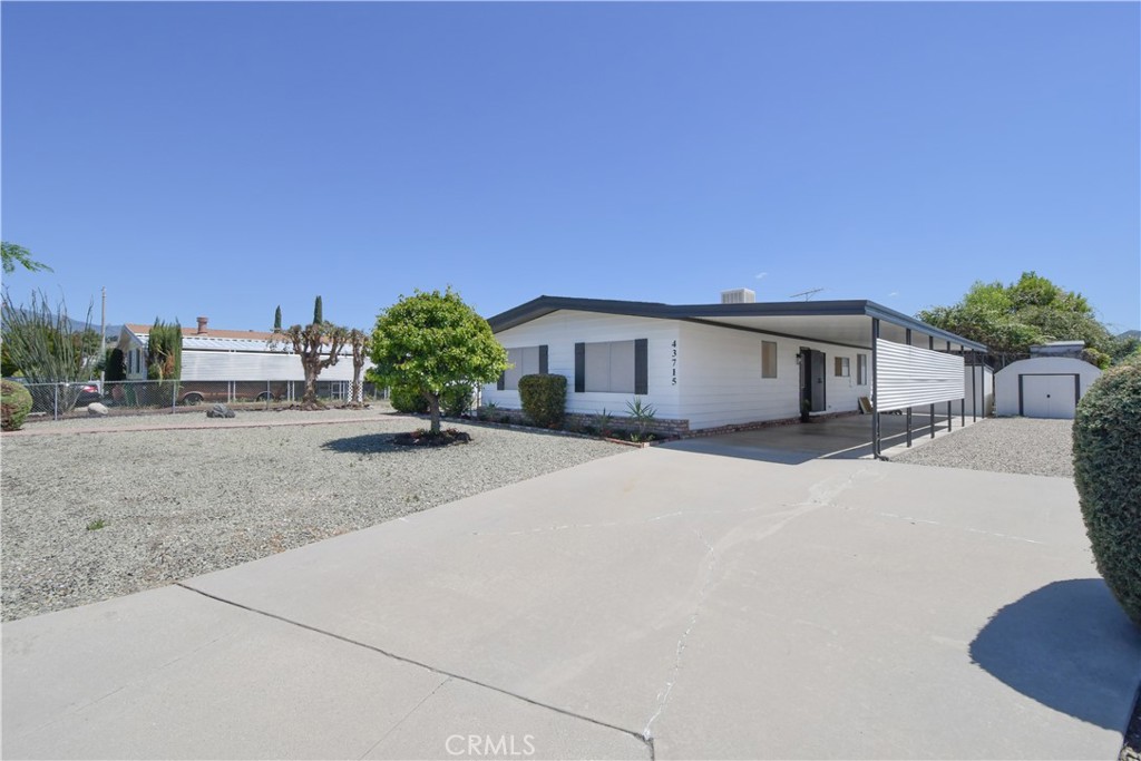 Adorable renovated home in 55+ Bautista Estates in East Hemet! 2 bedrooms and 2 bathrooms. Tons of brand new stuff here including the roof, paint inside and out, laminate flooring throughout the entire home, quartz counter tops in the kitchen, bathrooms and desk area, sinks and faucets, and window shades. Light and bright open floor plan. Quiet and peaceful cul-de-sac location. RV parking and large lot. Seller financing available for qualified buyers! There are no park fees here, you own the land and HOA is only $50 a year! This home is cute as a button and move-in ready!