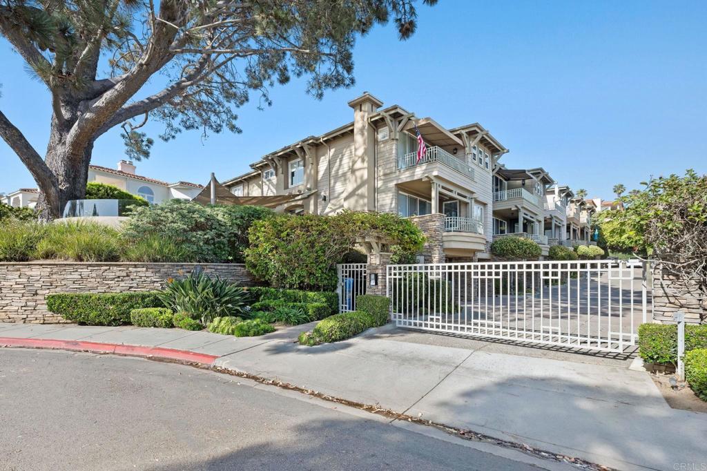 Discover the perfect blend of luxury, comfort, and convenience in this stunning detached home, ideally situated within a private, gated enclave of just five residences. Located just a short stroll from the Cedros Design District, Del Mar Beach, Dog Beach, local artisan shops and restaurants, the iconic Belly Up, and the Del Mar Racetrack and Fairgrounds, this home offers unmatched access to the best of coastal living. With I-5 nearby, you’ll enjoy seamless connectivity without sacrificing serenity. The beautifully landscaped private backyard creates effortless indoor/outdoor living, with direct access from the main living area—ideal for relaxing, entertaining, or dining al fresco. Inside, the open-concept great room features remodeled kitchen with island seating, a cozy breakfast nook, family room, and formal dining area, all opening out to a verandah on the main level. Custom shuttered cabinetry, top-tier appliances, and striking granite countertops in serene seaside hues of green and gray bring both elegance and calm to the space. Upstairs, the spacious primary suite offers a peaceful retreat with a sitting area, a private balcony boasting white water ocean views, a spa-inspired bath with dual sinks, and a generous walk-in closet. Additional upscale finishes include limestone and natural stone flooring, and soft looped wool carpeting. Smart home features include Ting fiber-optic internet, a new HVAC system with mobile climate control, and leased solar panels paired with a Tesla Powerwall—enhancing energy efficiency and offering peace of mind. Set within an award-winning school district and just moments from everything Del Mar has to offer, this exceptional home combines luxury, location, and lifestyle into one perfect coastal escape.