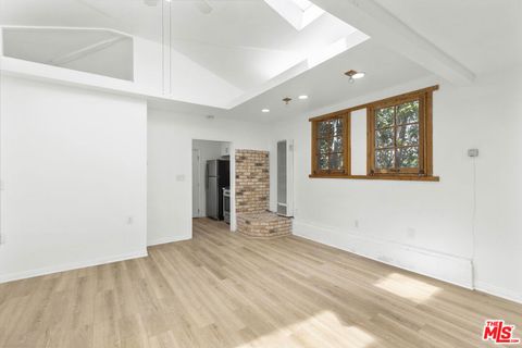 Photo of 11110 Charnock Road, Los Angeles, CA 90034 (MLS # 25610143) Photo of 11110 Charnock Road, Los Angeles, CA 90034 (MLS # 25610143)