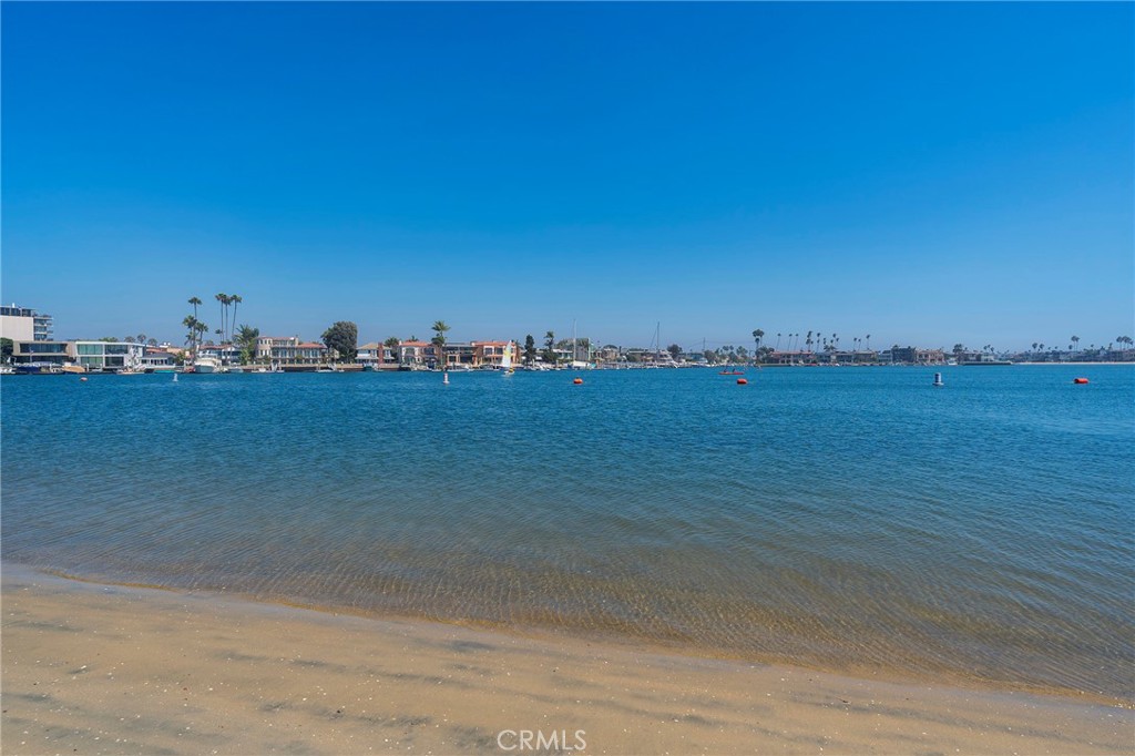 An exceptional opportunity to own a one-of-a-kind beachfront property on the coveted Bay side of Long Beach Peninsula. This sun-drenched retreat offers unobstructed panoramic views of the bay, nearby islands, and marina—without a bike path between you and the sand. Just a short stroll to the Yacht Club, this home blends privacy, luxury, and coastal charm in an unbeatable location.
Originally designed as a triplex, the upper two units have been seamlessly combined to create a spacious 5-bedroom, 2-bath layout, connected by an interior doorway. One side includes a 3-bed, 1-bath space, while the other offers 2 beds, 1 bath and an elevator for convenient access.
The lower-level unit has been fully renovated and boasts 2 bedrooms, 1 bathroom, and direct beachfront access with a private patio—perfect for entertaining or enjoying the ocean breeze.
Situated at the end of a quiet cul-de-sac, the property includes four garages and a 30-foot boathouse, making it ideal for boaters, multi-generational living, or rental income potential. There is also a private office within the complex with a 1/2 bath.
Don't miss your chance to own this rare slice of paradise with endless possibilities. Trust sale. Please see agent private remarks for offer process.