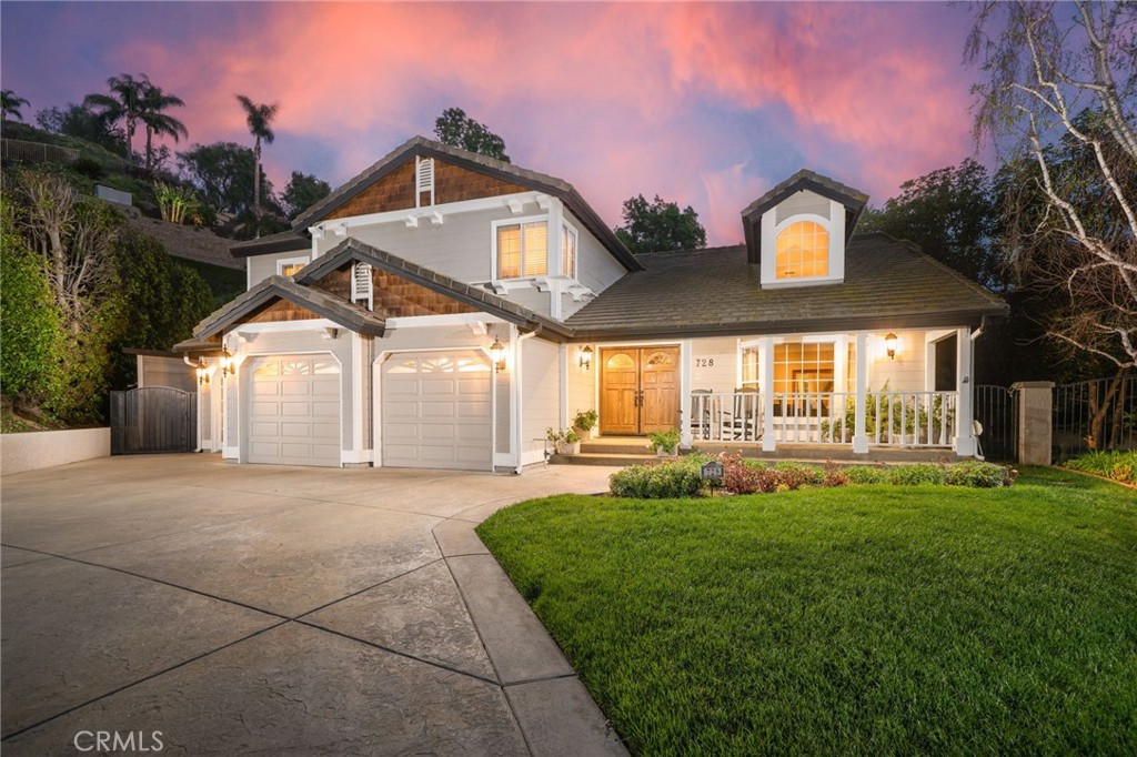 Nestled in a private, prime location, this picturesque Glendora home offers breathtaking mountain views and an expansive lot. The charming front porch greets you as you enter this beautifully remodeled residence, featuring 4 spacious bedrooms, 3 luxurious bathrooms, and 3,164 SF of well-appointed living space, all set on a 23,435 SF lot. The resort-style backyard is an entertainer's paradise, complete with a rock pool and spa, built-in BBQ, two lush lawn areas, and a landscaped hillside with a serene gazebo. It’s the perfect spot to relax or host gatherings. Step inside to find a formal living room with stunning picture windows and soaring high ceilings. The newly updated kitchen is a chef’s dream with a center island, custom Neolith counters, new cabinetry, stainless steel appliances, including a gas cooktop with pot filler, double ovens, and a built-in refrigerator. The spacious dining area, adjacent to the kitchen, includes a built-in buffet with glass cabinets for extra storage and French doors that open to the pool area. The great room/family room features a cozy fireplace, custom built-ins, French doors leading to the pool, and a Convenient desk for work or study. The main level also includes a laundry room with a sink, extra cabinets, and access to the garage, along with a bathroom with a shower. Upstairs, the luxurious primary suite features double-door entry, a custom walk-in closet, and an en-suite bathroom with a dual sink vanity, spa bathtub, and a large walk-in shower. The three additional bedrooms are spacious with mirrored closet doors, and there is a beautifully remodeled bathroom with quartz counters and a bathtub/shower combination. The professionally landscaped backyard offers complete privacy, with a river rock pool and spa featuring a waterfall, built-in BBQ area with seating, space for al fresco dining, two expansive lawn areas perfect for children’s play, and a hillside with fruit trees and panoramic views. The custom gazebo adds to the charm of the space, and hillside lighting enhances the ambiance in the evenings. A convenient storage shed provides additional space for your needs. The home also boasts a spacious driveway and a three-car garage, complete with built-in cabinets and epoxy flooring. The third bay has been thoughtfully converted into a gym with French doors and built-in storage.
This remarkable home in Glendora is truly one-of-a-kind and is ready to welcome its next owner!