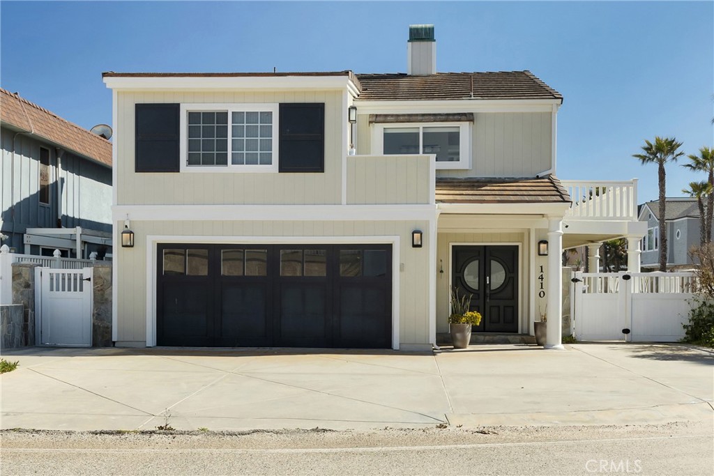 Drift off to the soothing sounds of the ocean! This home is just a skip hop and jump across a narrow lane from the beautiful beach of Oxnard, offering beautiful views of the ocean, channel Islands, and the golden sand dunes. This exceptional 4 - bedroom, 5 - bathroom home has a full kitchen, family room, and dining room upstairs with numerous upgrades and top-of-the-line appliances, including a Subzero fridge and Wolf stove top, while the downstairs offers a den with an additional kitchenette. A grand entry leads into a formal living room with new sliding doors opening to a private patio. Two generously sized bedroom share a bathroom on this level. The second floor is anchored by a soaring beamed ceiling and elegant marble fireplaces in both the master suite and living room. The kitchen features glass cabinets and is fully equipped with easy access to a viewing deck. The master suite includes another set of sliders to the deck, along with a vaulted ceiling. The master bath offers both a separate tub and shower and a connected closet with a stacked washer and dryer. A fourth bedroom and another bathroom are conveniently located off the kitchen. Throughout the home, you’ll find beautiful wood floors, fresh paint, custom shutters, and stylish lighting this is a musty property, offering a prime location, just steps from the beach with fantastic access.