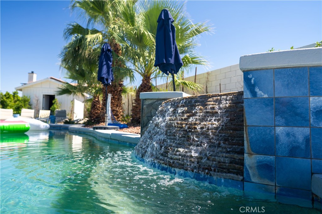 Excellent AIRBNB investment-ready home with NO HOA! This turnkey home comes with all furniture and items in pictures! Updated and furnished home is ready for entertainers and guests. Home features a big, open plan with a spacious kitchen and island/bar. The 3 comfortable bedrooms and 2 baths are just the right size. In the backyard you are greeted by a large, covered patio and lots of luscious, green grass. The sparkling pool and spa are a must-see! The expansive 11,326 sq ft lot (0.26 acres) comes with a storage shed and is surrounded by ficus and still has plenty of room for additional structures. Whether you're buying for investment or for your primary residence, you'll love how this home shows.