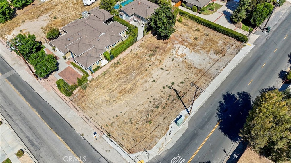 Rare Builder Opportunity in the Heart of Simi Valley! This 11,325 sq. ft. flat corner lot located in one of Simi Valley's most cherished communities is the perfect canvas whether you’re a builder seeking your next project or a buyer ready to design your dream home. Surrounded by beautiful custom homes and conveniently located near Adventist Hospital and shopping centers, the property offers both community charm and everyday convenience. Key groundwork has already been completed — including a topography survey, soil and geological reports, and utility (electrical, water and sewer connected) saving you valuable time and upfront costs. A geotechnical review confirms the site is suitable for development, and preliminary schematic plans are available for a 3,869 sq. ft. custom two-story home. Located outside California Earthquake Fault Zones and within the unincorporated area of Ventura County, the lot offers added flexibility to build. With so much of the prep work done, this property is ready for you to bring your vision to life!