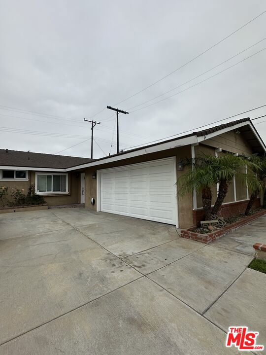 Welcome to this stunning and spacious single-level home featuring 4 bedrooms and an inviting open floor plan, situated in the highly West Garden Grove area. This residence boasts beautiful granite countertops, elegant wood flooring, and an abundance of natural light, complemented by dual-pane windows and stylish crown molding throughout. Step outside to discover a beautiful backyard, perfect for outdoor gatherings or simply enjoying a peaceful afternoon in nature. The home is ideally positioned within walking distance to top-rated schools, making it perfect for families. You'll also find a variety of shopping, dining, and parks nearby, enhancing the convenience of your lifestyle. Enjoy the seamless blend of comfort and elegance in this lovely home, designed for both relaxation and entertaining. Don't miss the opportunity to make this your dream home in a vibrant community.