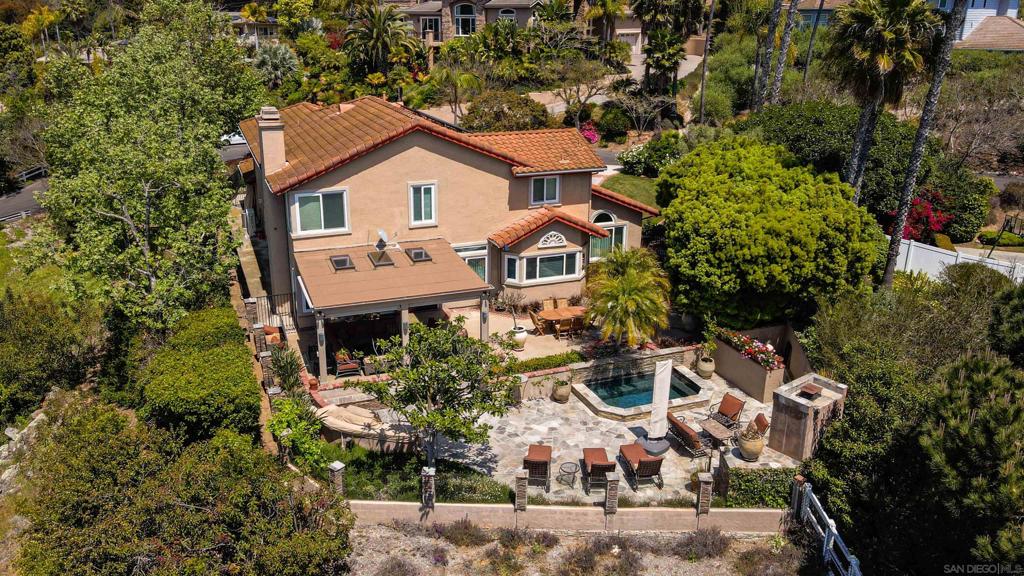 Your Brookside Retreat Awaits! Experience luxury living in this stunning Spanish-style villa, perfectly situated in the peaceful enclave of Olivenhain. Whether you're seeking a serene escape or a stylish home base for your San Diego adventures, this fully furnished retreat has everything you need—just bring your suitcase! Highlights Include: • RESORT-STYLE BACKYARD: Canyon views from your private outdoor oasis featuring a soothing pool, lounge area w/firepit, teak dining table for six, and cozy outdoor fireplace sitting area. • FULLY STOCKED: From plush linens and fluffy towels to a fully equipped kitchen and beach gear, every detail is covered. • INVITING LIVING AREAS: A grand entry welcomes you with soaring ceilings and a graceful spiral staircase. Light-filled living spaces include a living room, formal dining room, and family room with plush seating and fireplace. • CHEF'S KITCHEN: Open and bright with large windows framing the peaceful backyard. • COMFORTABLE SLEEPING FOR ALL! Primary Suite: King bed, high ceilings, spa-like bathroom with soaking tub and separate shower. Two Guest Bedrooms: Each with comfy queen beds; one features a large mounted flat screen. Downstairs Bedroom: High-end pull-out bed and smart TV—ideal for guests or work-from-home space. • VACATION VIBES EVERY DAY! Lounge poolside, enjoy a nightcap around the firepit, or unwind by the outdoor fireplace after taking in the sunset view. This home’s relaxed elegance ensures you feel like you're on vacation every moment of your stay. • PRIME LOCATION: Just 20 min from Cardiff Beach! Additional Information: • COMFORTABLE SLEEPING FOR ALL! Primary Suite: King bed, high ceilings, spa-like bathroom with soaking tub and separate shower. Two Guest Bedrooms: Each with comfy queen beds; one features a large mounted flat screen. Downstairs Bedroom: High-end pull-out bed and smart TV—ideal for guests or work-from-home space. • VACATION VIBES EVERY DAY! Lounge poolside, enjoy a nightcap around the firepit, or unwind by the outdoor fireplace after taking in the sunset view. This home’s relaxed elegance ensures you feel like you're on vacation every moment of your stay. • PRIME LOCATION: Just 20 min from Cardiff Beach and oceanfront dining! Close to shopping and hiking trails, too!
