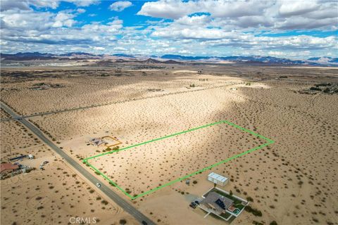 Photo of 101 Mesquite Springs Road, 29 Palms, CA 92277 (MLS # JT26104475)