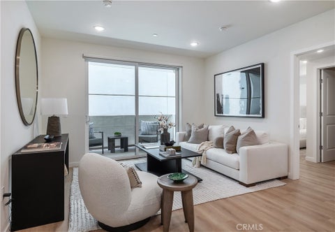 Photo of 1303 S Orange Grove Avenue #603, Los Angeles, CA 90019 (MLS # SB26081705)
