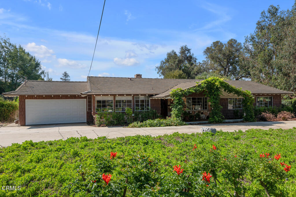 Welcome to 456 Avocado Place, an exceptionally well-maintained Classic California Ranch in the coveted Las Posas Estates. Move-in ready yet brimming with opportunity, this property sits on a generous, mostly flat 3/4-acre lot--ideal for those seeking privacy, room to expand, or space for a large garage, workshop, or additional ADU. The home's warm original woodwork reflects the timeless charm of the California Ranch era, while thoughtful updates provide modern comfort. Both bathrooms have been completely renovated, and the refreshed kitchen features granite counters, brand-new appliances, and large windows that flood the space with natural light. The versatile floor plan offers four generously sized bedrooms, each with large windows and full-size closets, plus a bright, inviting living area where sliders connect seamlessly to the poolside backyard--creating an effortless indoor-outdoor flow perfect for gatherings large or small. The expanded garage includes a laundry and mudroom, plus a flexible bonus space perfect for an office, craft room, or gaming lounge. Outdoor living shines here--two large side yards provide multiple buildable areas, and the backyard features a classic pool as a stunning focal point, visible from the main living areas through the expansive sliders. It's rare to find a home in the Estates that is this well cared for, truly move-in ready, and offering such incredible potential--whether you envision creating a luxury estate, a multi-generational compound, or simply enjoying the serenity of this classic ranch as it is. Unbeatable location for work, play, and relaxation: from serene coastal days to city nights, you're just 20 minutes to the beach and an hour to Santa Barbara or Los Angeles.