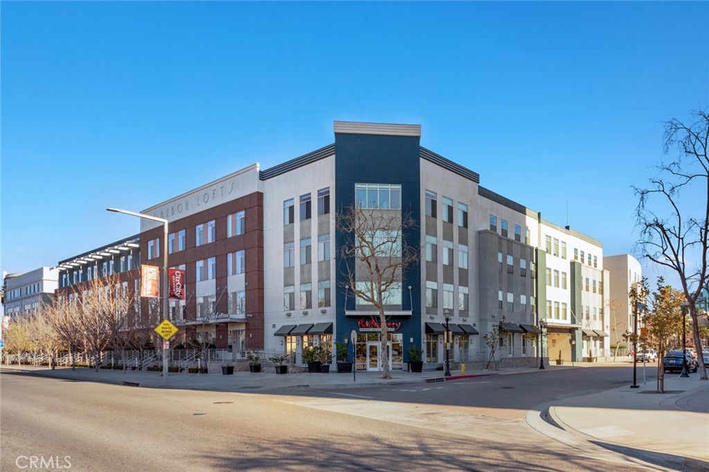 Welcome to Harbor Lofts Community In Downtown Anaheim. This beautifully renovated 2 Bedroom 2 Bath is move in ready. One of the few units to have its own private patio as well as a car charging station set up at assigned parking space. Beautiful upgraded kitchen with quartz counter tops, new cabinets with soft close drawers, built in cabinets for extra storage and custom closets! Perfect location for walking to the Promenade, Anaheim Packing House or The Mix.