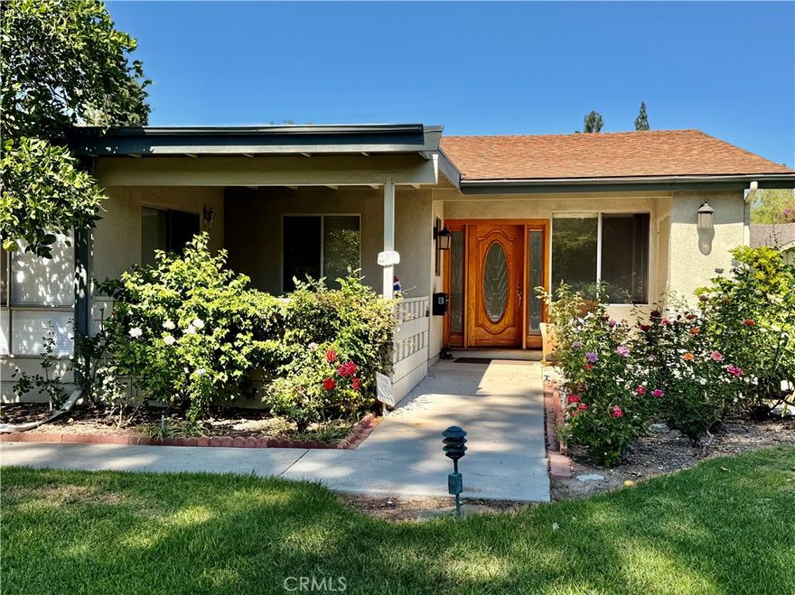 This special single level, Valencia-2 cottage style residence with NO STAIRS and no one above or below, offers serene views that make it truly special. A front patio with lots of colorful rosebushes nearby, leads into a bright interior with vaulted ceilings in the living room and ceramic tile flooring throughout the spacious living area. A converted atrium with skylights expands the home and brings in natural light. The kitchen, living room, and primary bedroom, all overlook the wide green belt that gently slopes toward Aliso Creek, creating a tranquil backdrop, filled with trees, open lawn, and seasonal blooms. Whether enjoying morning, coffee on the private patio or relaxing inside with garden views, this home is designed for peaceful everyday living. It also has central A/C, and added interior square footage with the converted atrium. Second bedroom can make a perfect den. W/D will be installed in bathroom. Beyond the home itself, life in Laguna Woods Village offers the best of resort-style 55+ living. This gated community spans over 2,100 acres with 24-hour security and features two golf courses, five pools, multiple fitness centers, and seven clubhouses. With more than 250 clubs and organizations, an equestrian center, and a performing arts theater, there’s truly something for everyone. Convenient transportation services, nearby shopping and dining, and quick access to Laguna Beach and top medical care make this location both active and convenient.