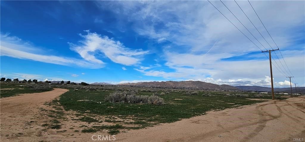 Photo of 0 Zuni Road, Apple Valley, CA 92307 (MLS # SW25249433)