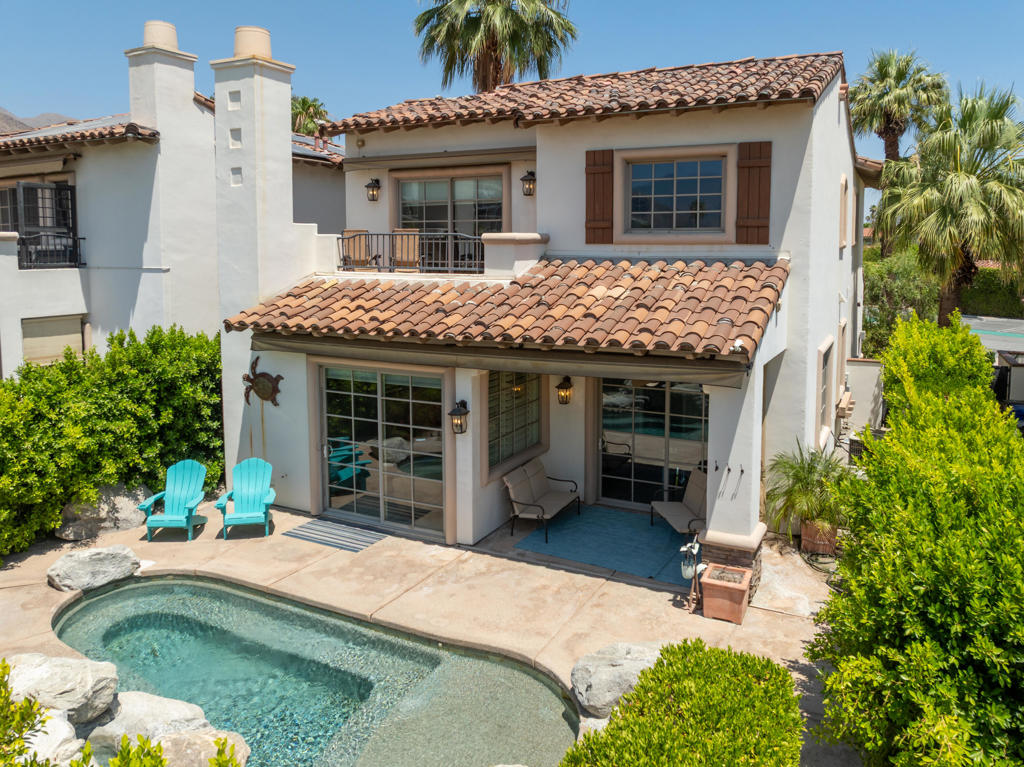 Long term lease & turnkey furnished. A beautiful, upgraded pool home located in the exclusive Movie Colony neighborhood of Palm Springs. Across the street from The Colony Palms Hotel and walking distant to restaurants and all Palm Springs offers. Spectacular mountain views from the living room & dining room, both with sliding doors out to the patio & a backyard that showcases a stunning pebble tech pool with spa and natural stone waterfall. The living room also has built in cabinets and features a fireplace. This is a 2 bedroom, 2.5 bath, 2 story home with a loft/office space. The kitchen has been completely remodeled with new cabinetry, quartz countertops, stainless steel high end appliances, and built in wine cooler. The spacious primary bedroom has a walk in closet with shelving, the en suite bathroom has a double vanity and a large soaking tub. The second bedroom boasts wrap around mountain views, mirrored closets & en suite bathroom with walk in shower.The backyard is fully enclosed with a brick wall and ficus trees for privacy. Other features of the home include a covered patio with outdoor fan, retractable awnings on first and second floor, vinyl wood plank flooring throughout home, custom shutters and Hunter Douglas coverings on sliding glass doors. The laundry room has custom built in cabinets & quartz countertops. The 2 car garage has epoxy floor and plenty of space for storage. Small pet is allowed and will consider long term lease from 6 months to 1 year.