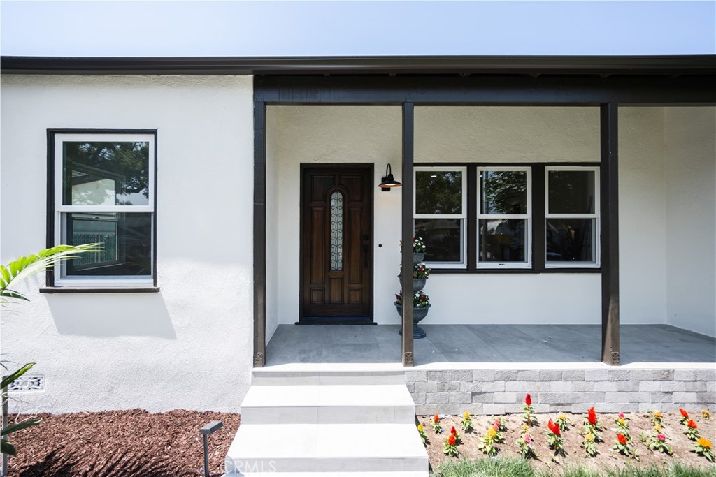 Welcome to this completely remodeled, stunning property featuring a spacious 6471 SQF lot and a well-maintained 1434SQF home, located in a quiet and sought-after neighborhood. This charming residence offers three bedrooms, providing the perfect balance of comfort, charm, and functionality. As you step inside, you’re greeted by a gracious formal entryway that leads into an elegant family room, ideal for entertaining family and friends. The expansive den is a highlight of the home, offering plenty of room to relax and unwind by the cozy fireplace, which adds warmth and character to the space. Beautiful hardwood floors in the home enhance its timeless beauty and elegance. The laundry room provides added convenience and ensures that everything stays organized. Outside, the property is just as impressive. A detached garage with an additional workshop space offers plenty of storage and room for projects. The private patio area is perfect for relaxing outdoors, dining, or hosting gatherings with loved ones. This home has been meticulously cared for, offering a rare combination of vintage charm and modern convenience. Don’t miss out on this incredible opportunity to own a home with both character and versatility.