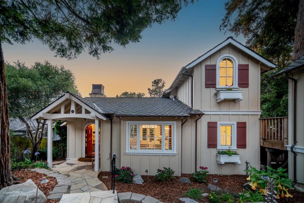 This beautifully updated 4 or 5 bedroom, 3 & 1/2 bath home with 2,273 sq. ft. of stylish living space on this downtown 6,000 sq. ft. lot. The home features hardwood floors, updated kitchen and bathrooms, fresh paint inside and out. Enjoy expensive views from Point Lobos to The Lodge and Pebble Beach Golf Links, with year-round sunset ocean views from the upstairs bedroom and balcony. Relax and entertain on the spacious main level deck off the great room overlooking the freshly landscaped backyard. Conveniently located with easy access to Carmel Beach, Pebble Beach and Downtown Carmel to enjoy the world class shopping and restaurants. A one-of-a-kind must-see charming and spacious Carmel coastal retreat!