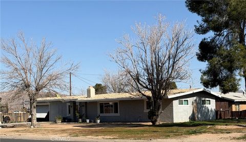 Photo of 13981 Pawnee Rd, Apple Valley, CA 92307 (MLS # CV26017537)