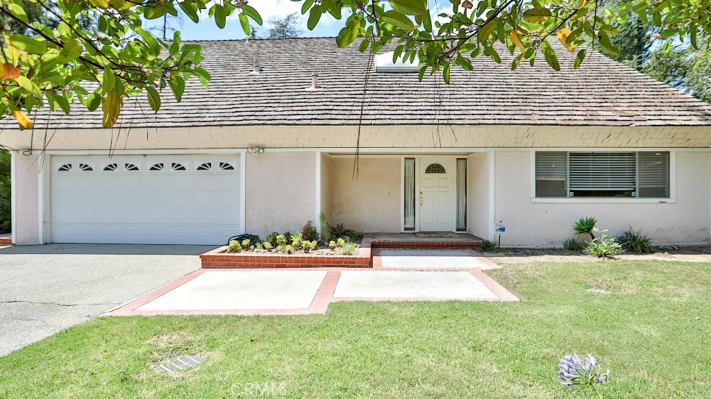 Attention Investors and First-Time Home Buyers! Bring your vision - and your paintbrush - and transform this rare opportunity into the home of your dreams. For the first time in nearly 40 years, 5714 Alder Ridge Drive in La Canada Flintridge is on the market! This spacious two-story home features 4 bedrooms, 3 bathrooms, and 2,552 sq ft of living space, set on a generous 10,933 sq ft lot. The thoughtfully designed layout includes a private en-suite primary bedroom in its own wing, leading out to a private balcony. Two additional bedrooms and a full bathroom are located in a separate wing. A downstairs bedroom with an adjacent bathroom is ideal for guests, a home office, or in-law accommodations. Easily entertain in the formal living and dining rooms, located on one side of the home, while a spacious kitchen and family room create a welcoming hub on the other. Nestled in a tranquil cul-de-sac, the home boasts a private backyard perfect for unforgettable family gatherings and relaxing evenings.