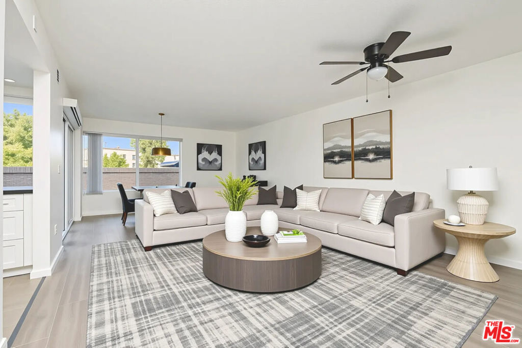 Welcome to a warm and inviting lifestyle in the heart of Northridge, where comfort meets convenience in this beautifully updated two-story townhouse. Nestled within the gated Peppertree community, you'll enjoy secure living and resort-style amenities including a sparkling pool, relaxing spa, and tennis courts, perfect for unwinding or staying active close to home. Just outside your front door, a serene grassy courtyard offers a peaceful welcome and a perfect spot to enjoy a cup of coffee or chat with neighbors. And just beyond the pool and tennis courts, you'll find an expansive, park-like grassy area, ideal for soaking up the sun, stretching out with a good book, or giving your pup space to run and play. Inside, the home is bright and welcoming, with natural light filling the open-concept living space. A private patio offers a perfect retreat for outdoor dining or weekend gatherings. The remodeled kitchen (2023) features modern finishes and flows easily to the dining area. Conveniently located on the main level is a powder room with a laundry closet, designed for everyday functionality and ease. Upstairs, all three bedrooms offer peaceful retreats with abundant sunlight and practical closet space. The primary suite features its own private bath, while the second full bathroom is located just down the hall from both secondary bedrooms. All 3 Bathrooms were remodeled in 2023! Fresh interior paint, new carpeting, updated light fixtures, and stylish window treatments throughout give the home a clean, move-in ready feel. With a new HVAC system installed in 2023, plus included washer and dryer, refrigerator, stove and microwave, this home offers both comfort and value. Enjoy two parking spots, one covered and one uncovered, and a location just minutes from CSUN, shopping, dining, and entertainment. This is more than just a place to live, it's a place to feel at home.