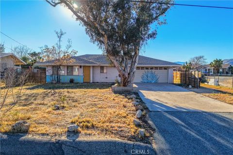 Photo of 7474 Lucerne Vista Avenue, Yucca Valley, CA 92284 (MLS # JT26062459)