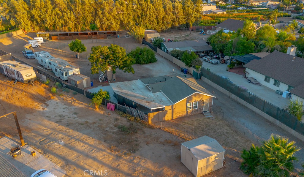 Charming and Private Equestrian Horse Property! Sitting on a Expansive 27,000 Sq Ft Lot in the City with a Country feel. Welcome to this beautifully maintained 3-bedroom and 1-bathroom home. This rare gem offers the perfect blend of equestrian functionality without compromising that family home feel. Whether you're boarding your own horses or looking to generate additional income, this property is set-up for a variety of uses including a 6-8 space horse stables. This quaint and delightful home offers the perfect setup with kitchen views of the horse arena. Outside is where this property truly shines. In addition to the unique amenities, the more than 1/2 acre lot offers 2 sets of RV hook-up's and a blank canvas to potentially build a ADU or additional improvements for the Ranch. Conveniently park the RV too!! With mature trees and abundant space located in a neighborhood with easy access to schools, parks, shopping, and major freeways—this would be the one you don't want to miss out on!!