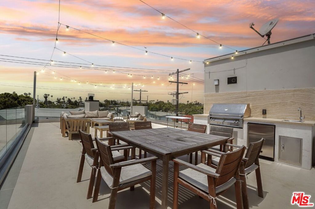 Don't miss this exceptional opportunity in the heart of Venice! Nestled on Abbot Kinney Blvd, this serene architectural retreat exemplifies modern urban living at its finest. Constructed in 2007 and masterfully designed by renowned architect Juan Garcia-Murari, AIA: LEED AP, this remarkable 2-bedroom, 3-bathroom residence showcases an open floor plan, soaring ceilings, and abundant natural light through expansive windows. Recently renovated with a contemporary warm touch, the inviting main floor features a picturesque living room seamlessly integrated with a spacious chef's kitchen, complete with a Sub-Zero refrigerator and Viking appliances. The airy master suite includes a generous walk-in closet and a luxurious master bath equipped with a Jacuzzi tub. Since acquisition, the property has seen numerous significant upgrades throughout the main floor, but most notably, the roof deck has been completely transformed, featuring new waterproofing, all-new exterior glass railings, skylights, and a brand-new built-in gas BBQ with a mini fridge. This sophisticated home offers a tranquil retreat in a prime location, mere steps from an array of renowned restaurants and coffee shops. Don't miss your chance to lease this stunning piece of Venice living!