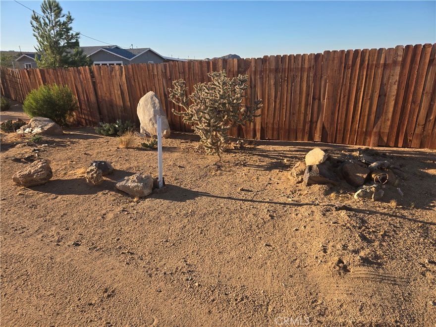 Discover your own slice of the high desert with this nearly one-acre property in Landers, California. With a paid water meter already in place, this lot is fully fenced and thoughtfully cleared, offering a clean slate to build your dream home. A few established plants add a touch of green, while the sweeping 360-degree views of the surrounding mountains and desert landscape provide a stunning backdrop for everyday living. Just minutes from local favorites like Gubler’s Orchids, the Integratron, and iconic spots like Pappy & Harriet’s, you're also a short drive from the awe-inspiring Joshua Tree National Park. This is your chance to claim peaceful desert living with convenience and character.