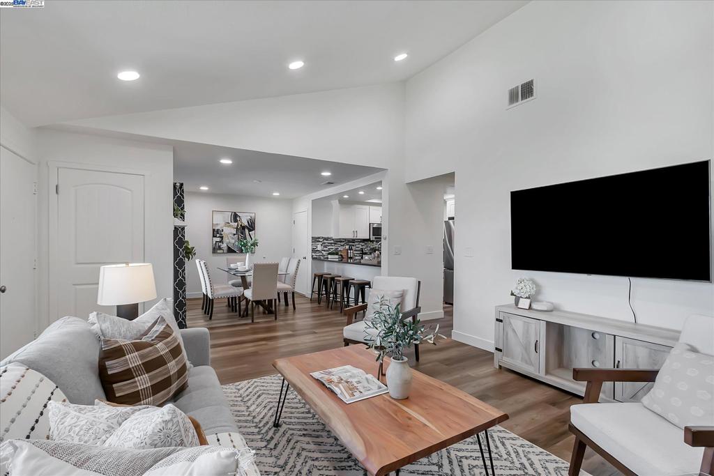 This updated 2-bedroom, 2-bath condo has been renovated throughout, and it offers comfort, convenience, and modern living in the heart of Silicon Valley. Step inside and enjoy an inviting open floor plan filled with natural light, a spacious living area with vaulted ceilings, a cozy fireplace and a private balcony perfect for morning coffee or evening relaxation. The remodeled kitchen features ample cabinetry and a functional layout, ideal for both everyday meals and entertainment. Both primary suites come with en-suite baths and large closets. Other updates include vinyl floors throughout, recessed lighting, granite countertops, new cabinets in the kitchen and bathrooms, stainless steel appliances, modern tiled showers, and reverse osmosis water filter. The home also features in-unit laundry, and an attached 2-car garage. This gated community offers residents access to sparkling pools, spa, and beautifully maintained grounds, all while being close to highways 101, 280, and 680 for an easy commute. Shopping, dining, schools and parks are just minutes away, making this the perfect balance of comfort and convenience. This condo is a must see for first-time home buyers or anyone who is rightsizing!