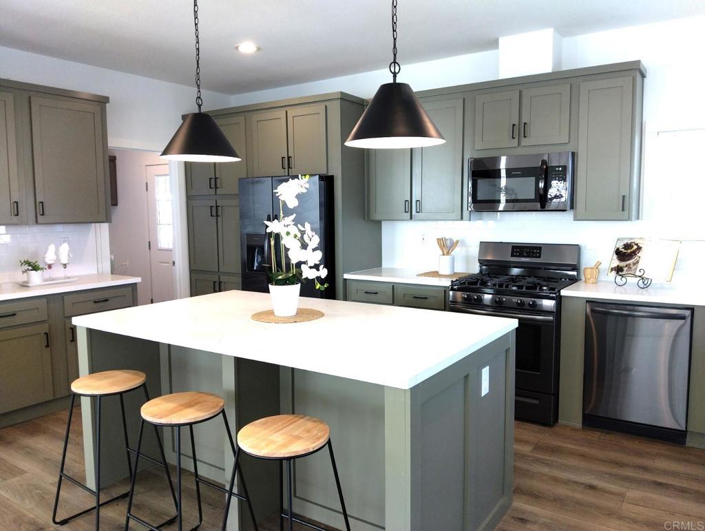 Huge Price Reduction! Open Sat. July 12, 12-2! BRAND NEW GORGEOUS home in Active Adult Community! Monthly land lease only $550 approx and under rent control!!! This open floorplan home has it ALL - plus she is built with energy efficiency in mind! Dream kitchen with quartz countertops and island, all appliances included. Greet your guests with the Ring doorbell and then welcome them into the huge great room with impressive, coffered ceiling. Enjoy your favorite beverage and ocean breezes from the large deck. The primary suite has a deluxe spa-like bathroom and HUGE walk-in closet! Every detail has been carefully selected so you can move right in! Tons of upgrades! Photos do not do it justice - this is a MUST SEE! Call today! Awesome amenities including pools, sports courts, clubhouse...FUN AWAITS! Serial 040660CAABAC